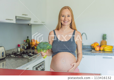 Embracing a nutrient-rich choice, a pregnant woman eagerly prepares to enjoy a wholesome serving of broccoli, prioritizing healthy and nourishing options during her pregnancy Embracing a nutrient-rich choice, a pregnant woman eagerly prepares to enjoy a wholesome serving of broccoli, prioritizing healthy and nourishing options during her pregnancy 113416132