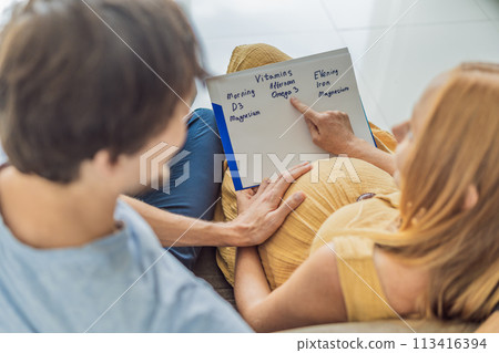 Expectant couple diligently compiles a list of doctor-prescribed vitamins for a healthy pregnancy, ensuring optimal care and well-being 113416394
