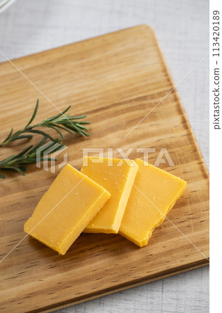 Red cheddar cheese 113420189