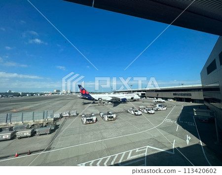 Plane seen from the boarding gate at Narita Airport 113420602