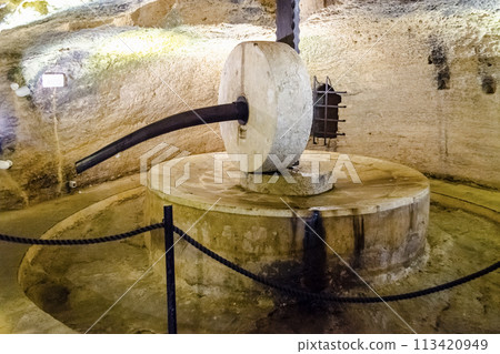 Disused ancient underground oil mill in Gallipoli, Italy Disused ancient underground oil mill in Gallipoli, Italy 113420949