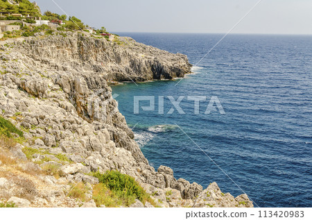 Beautiful scenic seascape at Ciolo Bridge, Salento, Apulia, Italy 113420983