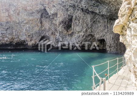 The scenic Zinzulusa cave and seascape in Salento, Apulia, Italy 113420989