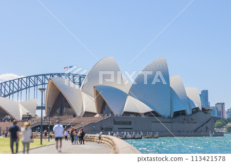 Sydney Opera House and Harbour Bridge seen from the sea (with blurred people) Sydney Opera House and Harbour Bridge seen from the sea (with blurred people) 113421578