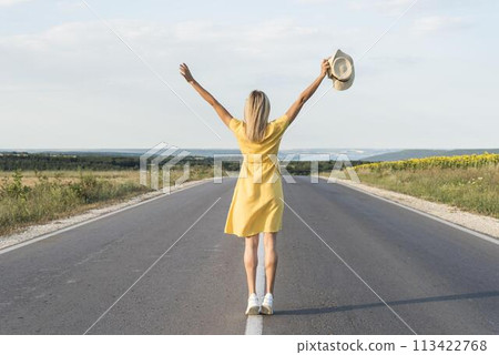 girl running in the middle of the street girl running in the middle of the street 113422768