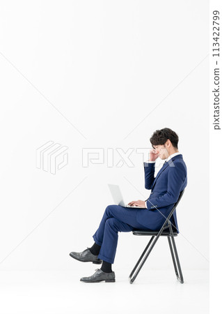 Business man, full body, sideways, sitting, computer Business man, full body, sideways, sitting, computer 113422799