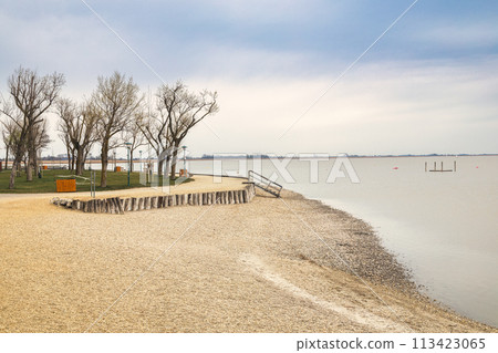Beach at The Neusiedl am See lake, Austria. Beach at The Neusiedl am See lake, Austria. 113423065