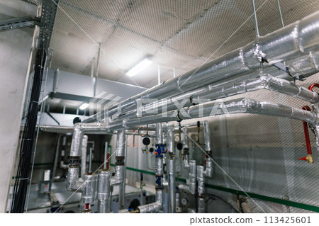 Pressure sensor in an industrial boiler room. Barometer in the heating system. Close-up. Pressure sensor in an industrial boiler room. Barometer in the heating system. Close-up. 113425601