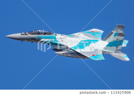 F-15 fighter jet (aggressor) flying in the blue sky F-15 fighter jet (aggressor) flying in the blue sky 113425906