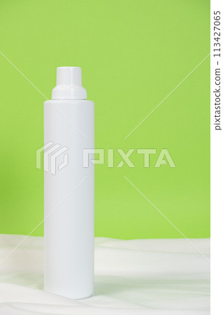 Large White Plastic Bottle for Household Chemicals on Green Background, Space for Text. Large White Plastic Bottle for Household Chemicals on Green Background, Space for Text. 113427065