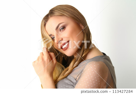 Portrait of beautiful blonde woman with makeup Portrait of beautiful blonde woman with makeup 113427284