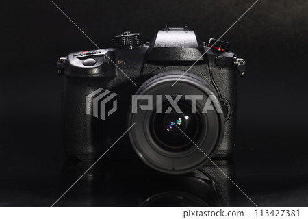 Black digital video camera closeup 113427381
