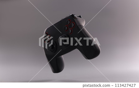 Black plastic wireless gamepad on gray background Black plastic wireless gamepad on gray background 113427427