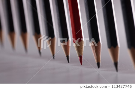 Black pencils in the center with red. 113427746
