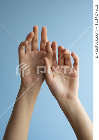 Human hands against clear background Human hands against clear background 113427912