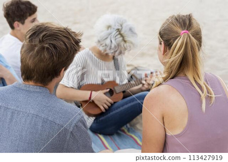 People celebrating the end of quarantine on the beach People celebrating the end of quarantine on the beach 113427919
