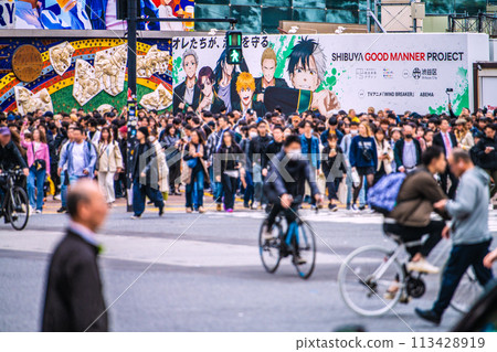 Tokyo cityscape in Japan: Dangerous bicycles racing through at breakneck speeds, it's insane... a sight never seen before the coronavirus pandemic... 113428919