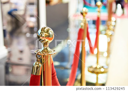 Golden pillars of festive fencing Golden pillars of festive fencing 113429245