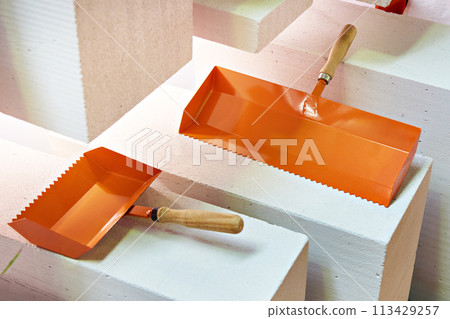 Building tools and foam concrete blocks 113429257