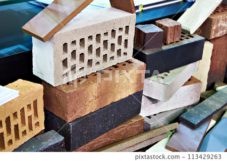 Bunch of different bricks 113429263