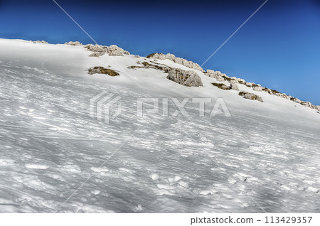 Scenic winter landscape with snow covered mountains, Campocatino, Italy Scenic winter landscape with snow covered mountains, Campocatino, Italy 113429357