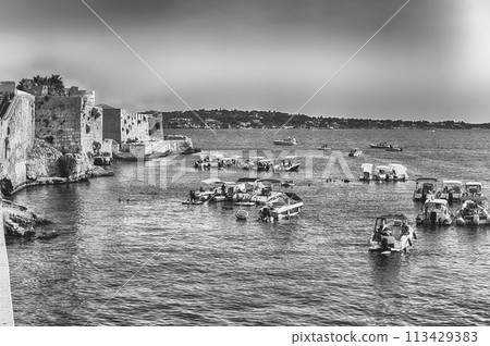 View of the scenic waterfront of Ortygia, Syracuse, Sicily, Italy 113429383