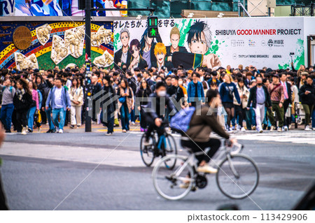 Tokyo cityscape in Japan: Dangerous bicycles racing through at breakneck speeds, it's insane... a sight never seen before the coronavirus pandemic... 113429906