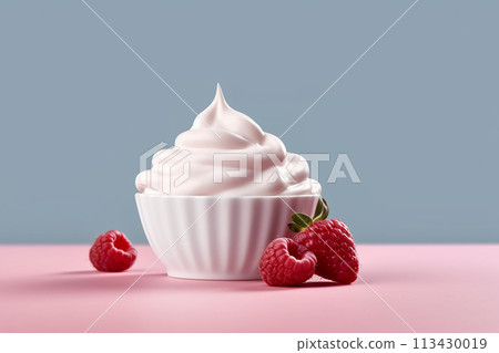 Pink raspberry yogurt in white cups against a blue background. 113430019