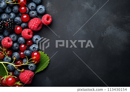 An assortment of fresh blackberries and raspberries isolated on white background. An assortment of fresh blackberries and raspberries isolated on white background. 113430154