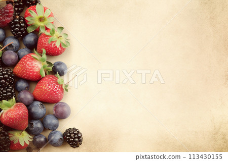 An assortment of fresh blackberries and raspberries isolated on white background. An assortment of fresh blackberries and raspberries isolated on white background. 113430155