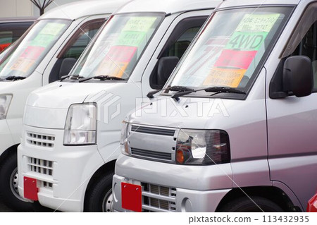 Used cars lined up at a dealership: Light vans Used cars lined up at a dealership: Light vans 113432935