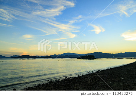Oyster rafts lined up in the Seto Inland Sea sunset Oyster rafts lined up in the Seto Inland Sea sunset 113433275