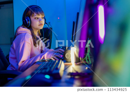 A woman enjoying the game A woman enjoying the game 113434925