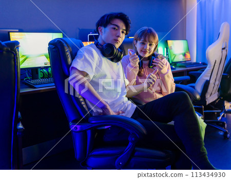 Couple enjoying the game Couple enjoying the game 113434930