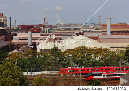 A view of the Meitetsu train and ironworks from Jurakuen Park, with the Meiko Triton in the background A view of the Meitetsu train and ironworks from Jurakuen Park, with the Meiko Triton in the background 113435010