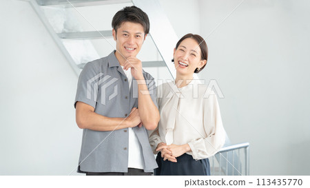 Male and female business people working in the office Male and female business people working in the office 113435770