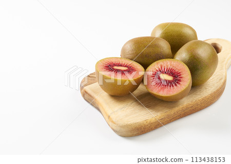 Kiwi fruit (ruby red) on white background Kiwi fruit (ruby red) on white background 113438153