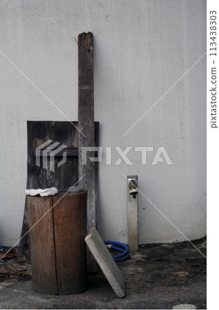 Water supply at the back door of a private house 113438303