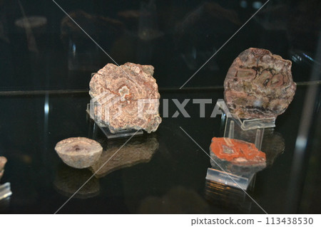 a large rock with a hole in it is floating in the air a large rock with a hole in it is floating in the air 113438530