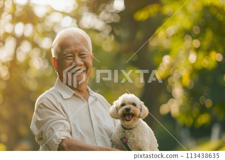 Elderly Asian man enjoying a walk with his dog in a sunny park Elderly Asian man enjoying a walk with his dog in a sunny park 113438635