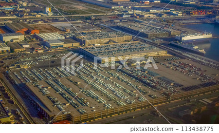 by plane over Barcelona seaport and parking lots by plane over Barcelona seaport and parking lots 113438775