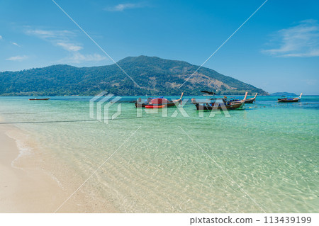 Beach and clear blue water in summer and vacation Beach and clear blue water in summer and vacation 113439199