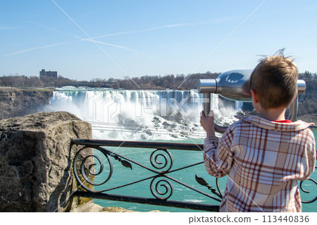 Coin operated telescope overlooking Niagara Falls. Coin operated telescope overlooking Niagara Falls. 113440836