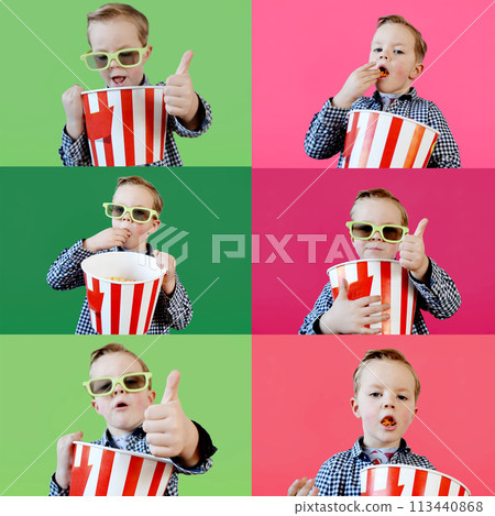 Cute fun kid baby boy 4 year old in red t-shirt holding bucket for popcorn 113440868