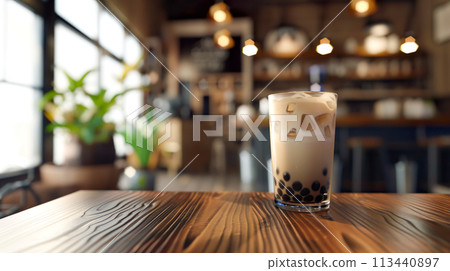 Tapioca milk tea on the table in a coffee shop 113440897