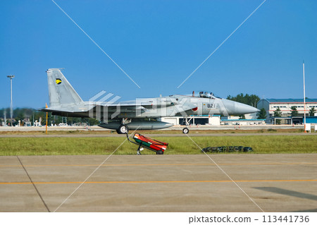 Air Self-Defense Force fighter jet F-15J heading to the runway 113441736