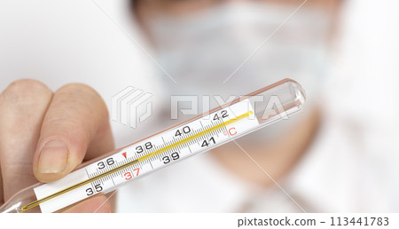 Doctor shows thermometer Doctor shows thermometer 113441783