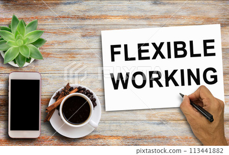 Business quotes, FLEXIBLE WORKING on notebooks or paper in office desk, office workplace Business quotes, FLEXIBLE WORKING on notebooks or paper in office desk, office workplace 113441882