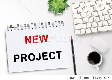 Business quotes, NEW PROJECT on notebook or paper in office desk, office workplace 113441896