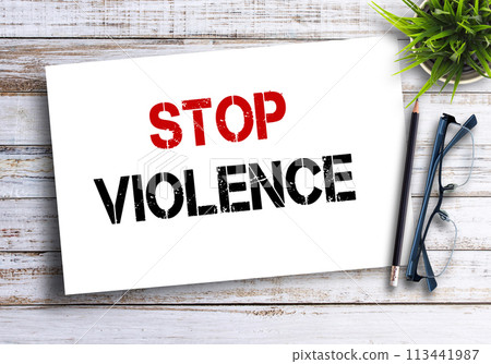Business quotes, STOP VIOLENCE on notebooks or paper in office desk 113441987